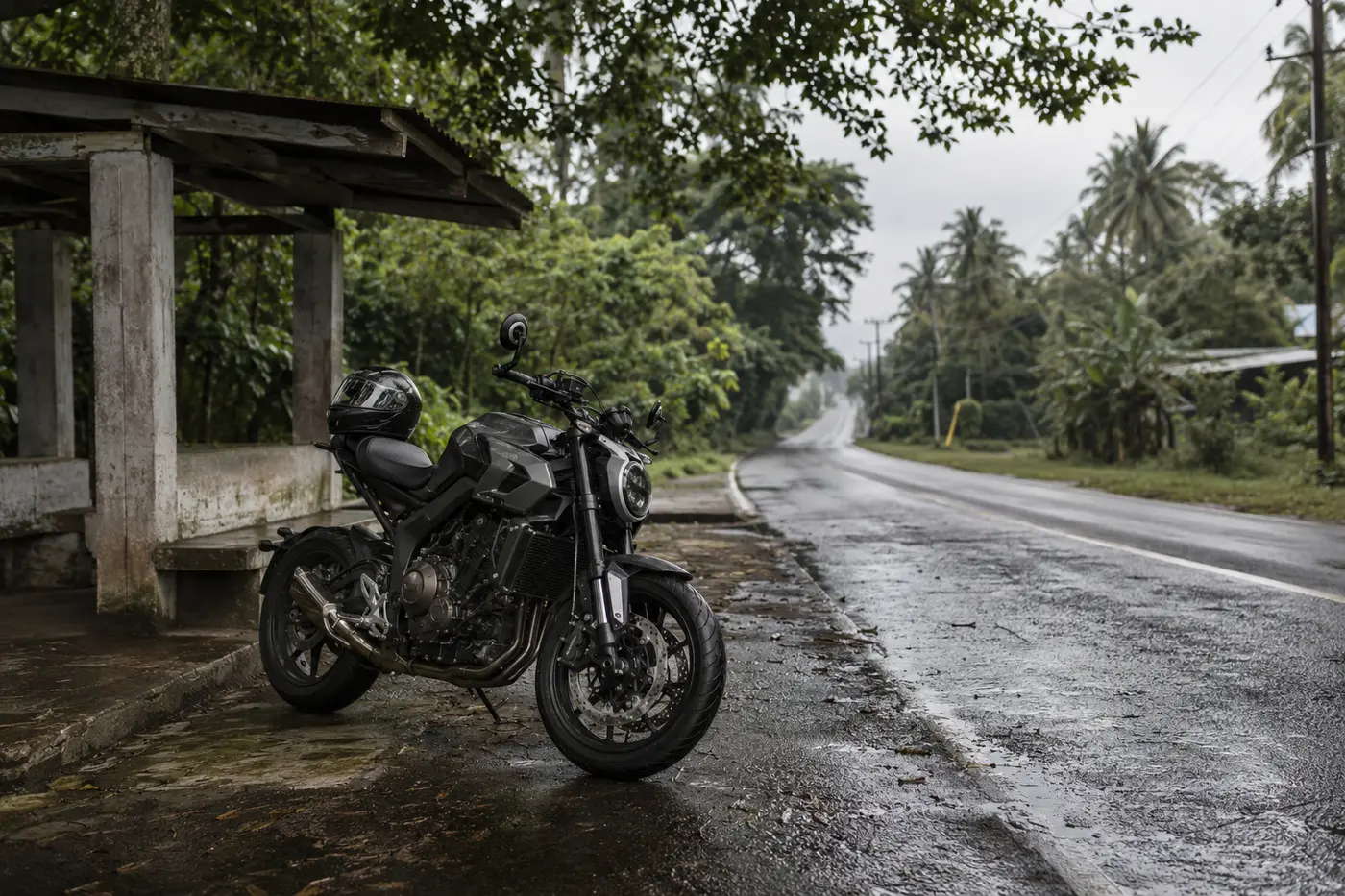 Motorcycle beside a wet Philippine road